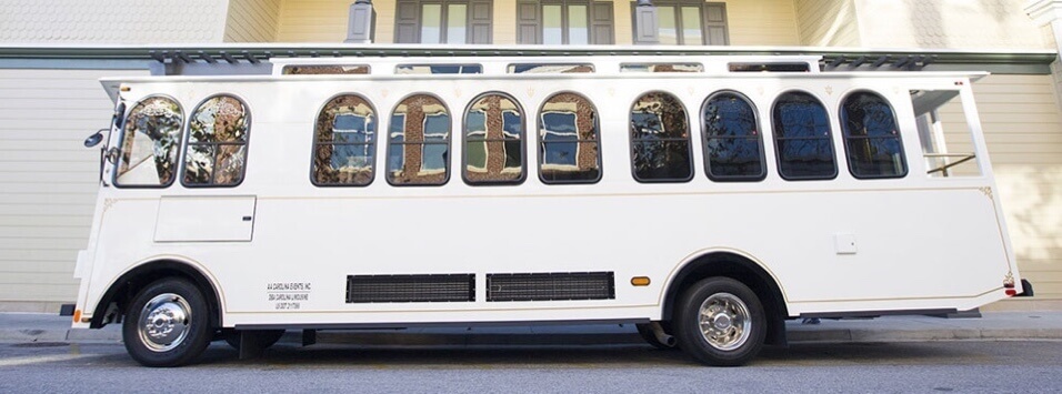 Side view of a white trolly