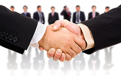 Handshake of business partner after a deal jpg