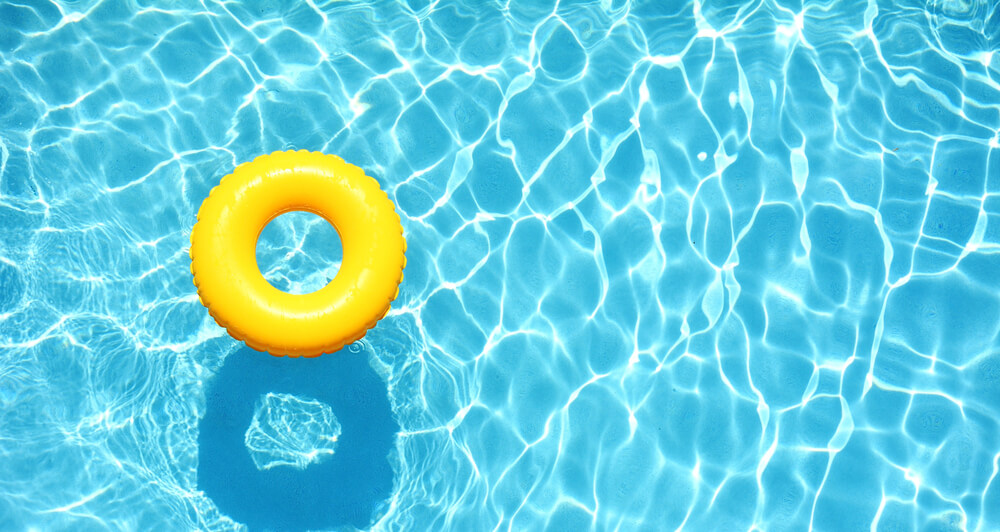 Yellow pool floats in a swimming pool