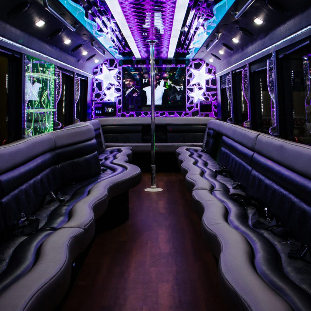 36-Passenger Limo Bus interior with TV on